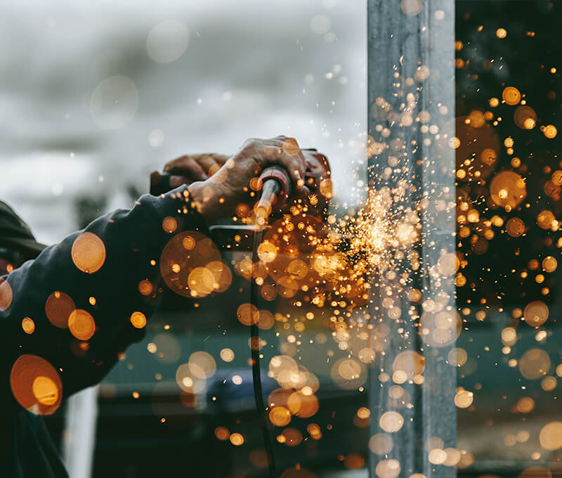 Orange and yellow welding sparks